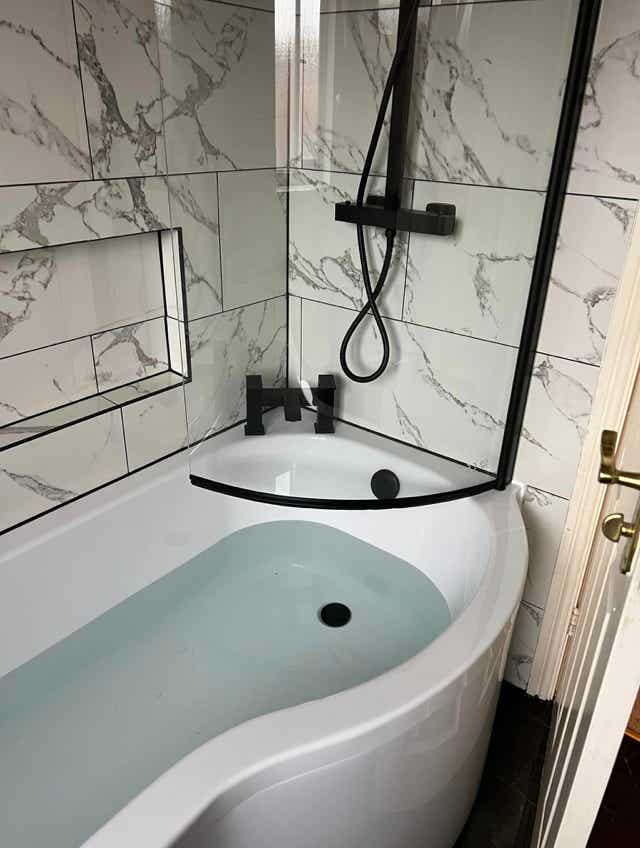 Herringbone floor pattern bathroom by Plumb Yorkshire.