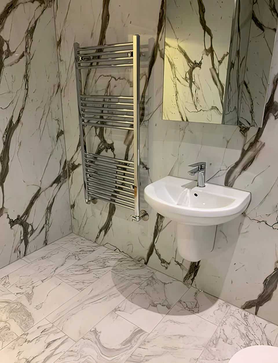 Image of wet wall panels in a stylish bathroom created by Plumb Yorkshire Ltd.