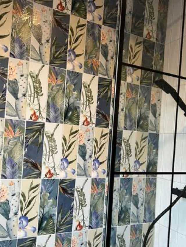 Eclectic tile shower design by Plumb Yorkshire.