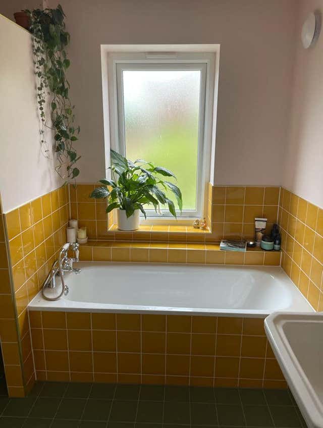 Spacious grey vanity bathroom setup by Plumb Yorkshire.