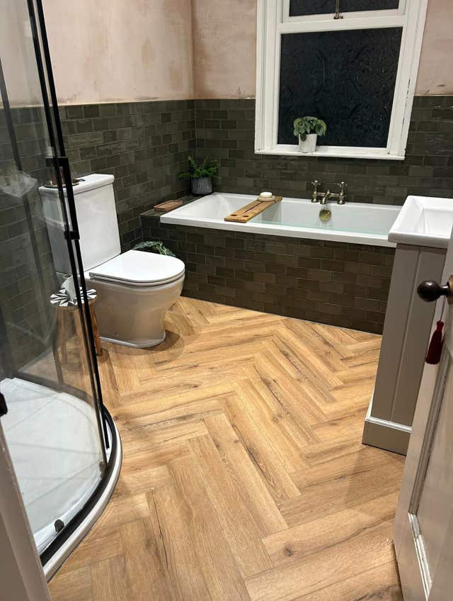 Herringbone floor pattern bathroom by Plumb Yorkshire.