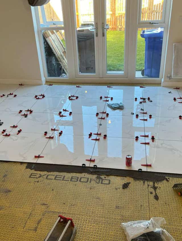 Tiling in progress at Plumb Yorkshire.