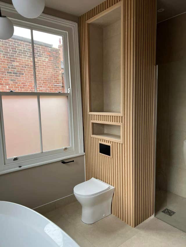 Minimalist bathroom storage solutions by Plumb Yorkshire.